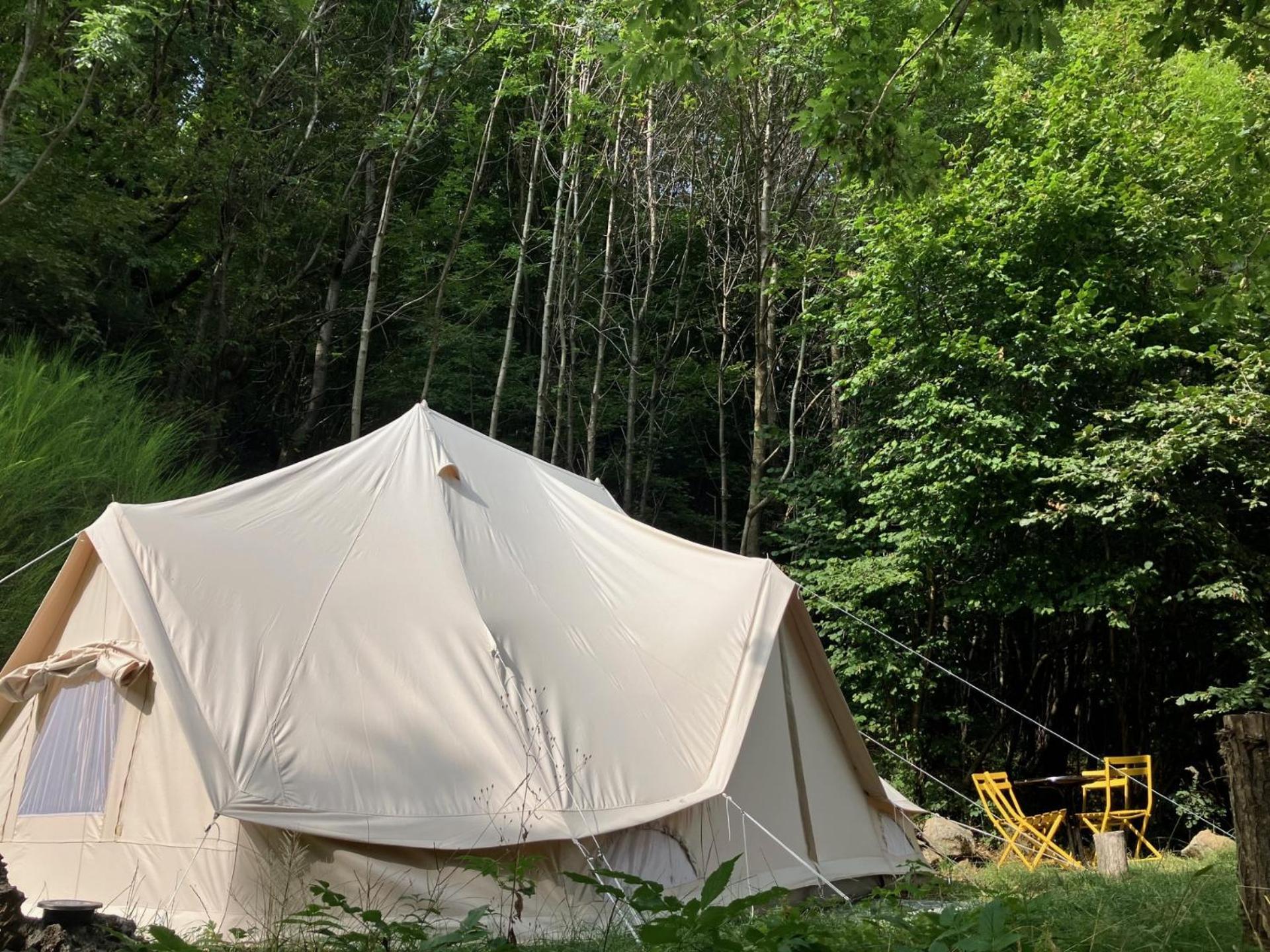 Grande Tente Tipi En Pleine Foret Burzet Exterior photo